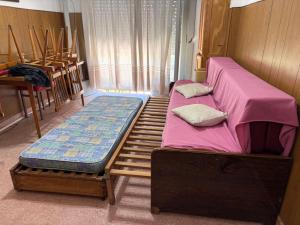 Postel nebo postele na pokoji v ubytování Monoambiente