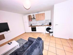 Køkken eller tekøkken på Cocon tout équipé avec jardin au centre-ville + 10 billeder