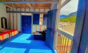 En eller flere senge i et værelse på Hostal Casa Pijao + 2 billeder