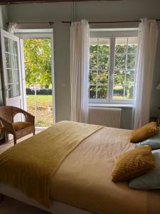 En eller flere senge i et værelse på Aurore de Beaufort