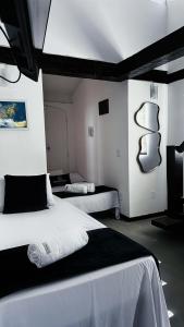 Giường trong phòng chung tại Chalé búzios