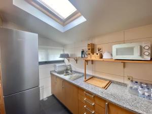 Køkken eller tekøkken på Cozy Studio & Patio in Funchal