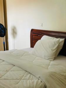 Giường trong phòng chung tại KAMIii APART +7 ảnh