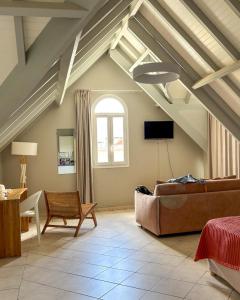 TV a/nebo společenská místnost v ubytování Village Creole