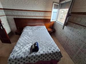 En eller flere senge i et værelse på Moroccan-style apartment mountain and coastal view