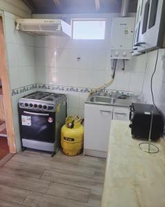 Kuchyň nebo kuchyňský kout v ubytování Casa Punta del Trueno