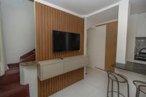 Et tv og/eller underholdning på Apartamento do Padin 2-2ª Praia