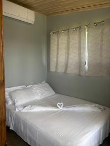 En eller flere senge i et værelse på Apartamento de una habitación