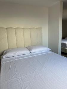 Postel nebo postele na pokoji v ubytování Sabaneta, Parque, Excelente ubicaciòn, Comodo, Buena vista