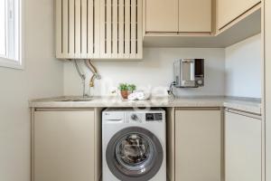 Køkken eller tekøkken på Praia & Conforto – Apto 350m da praia