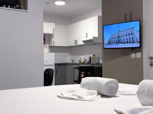 Nhà bếp/bếp nhỏ tại D' Suites Holiday Apartments +19 ảnh