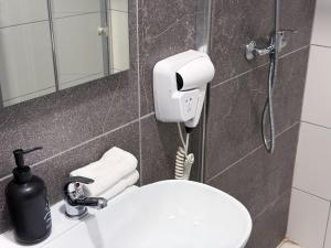 Phòng tắm tại D' Suites Holiday Apartments