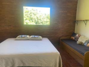 En eller flere senge i et værelse på Fortuna Casas de Campo