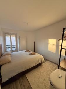 En eller flere senge i et værelse på CosyLoft