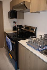 Køkken eller tekøkken på Lirios Miraflores Apartment + 1 billede