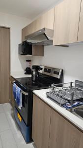 Køkken eller tekøkken på Lirios Miraflores Apartment