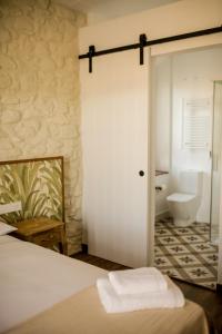 Et badeværelse på UMA Rural Boutique