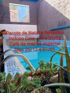 Swimmingpoolen hos eller tæt på Pousada Casa Jardim