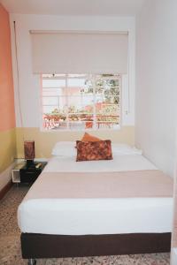 En eller flere senge i et værelse på Casa de Pinos Hotel Boutique + 42 billeder