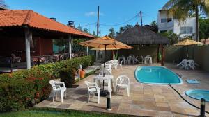 Swimmingpoolen hos eller tæt på Pousada Solar da Praia