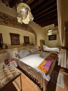 Giường trong phòng chung tại Atelier Oaxaca