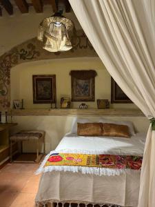 Giường trong phòng chung tại Atelier Oaxaca