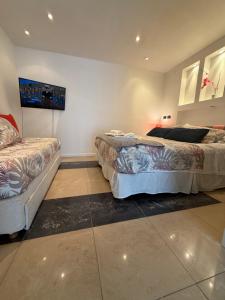 Zimmer mit 2 Betten in einem Zimmer in der Unterkunft SAN FRANCISCO in Comodoro Rivadavia