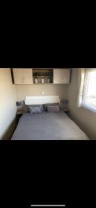 En eller flere senge i et værelse på Lamberts van