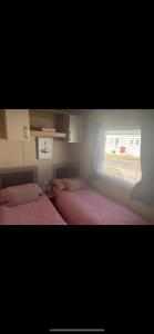 En eller flere senge i et værelse på Lamberts van