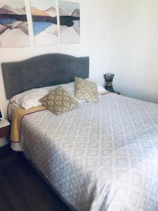 Giường trong phòng chung tại Edificio Altamar Avenida san martin 575