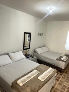 En eller flere senge i et værelse på Cozy Place + 3 billeder