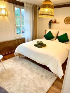 En eller flere senge i et værelse på Maison am Fluss + 12 billeder