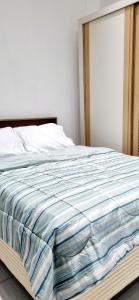 En eller flere senge i et værelse på Aconchego em Copacabana