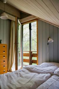 En eller flere senge i et værelse på Seaside Cabin With Views In Vestfold