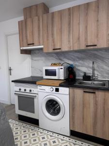 Køkken eller tekøkken på Apartamentos Turísticos Las Claras 1