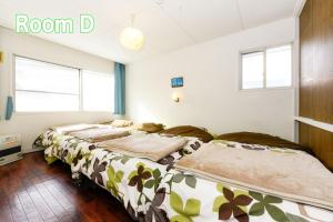 Postel nebo postele na pokoji v ubytování Sapporo - house / Vacation STAY 697