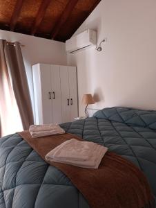 Postel nebo postele na pokoji v ubytování Cabaña La Sonrisa