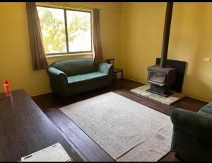 Posezení v ubytování Wellington Forest Cottages & Bar