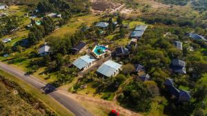 an aerial view of a house with a pool at Cabañas Villa Fariña in Gualeguaychú