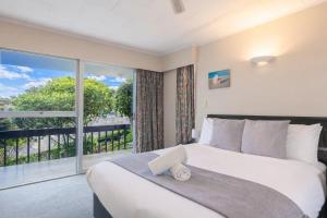 Postel nebo postele na pokoji v ubytování Classic Seaview Holiday Home in Shelly Park