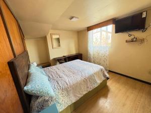 Postel nebo postele na pokoji v ubytování Hotel Spa Lo Aguirre