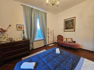 En eller flere senge i et værelse på Villa Carla - vicino alla Riviera del Conero e ai Colli dell' Infinito