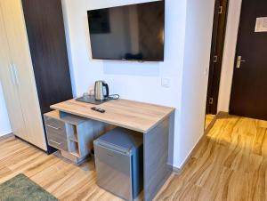 โทรทัศน์และ/หรือระบบความบันเทิงของ Byzanthin rooms