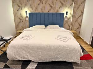 เตียงในห้องที่ Byzanthin rooms +19 ภาพ