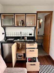 Kuchyň nebo kuchyňský kout v ubytování Sendero Nativo Glamping