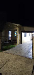 an empty garage in a house at night at Casa do Fernando in São Gabriel
