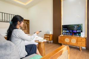 Et tv og/eller underholdning på The Full Hot Spring & Resort