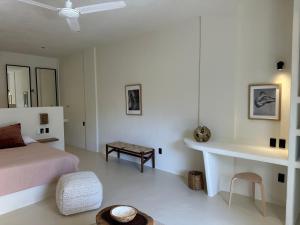 Llit o llits en una habitació de Hotel Men Zipolite 33 fotos més