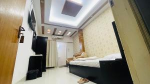 โทรทัศน์และ/หรือระบบความบันเทิงของ Hotel 71 INN Bogura +14 ภาพ