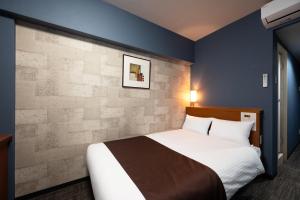 En eller flere senge i et værelse på HOTEL THE7 Kumamoto + 31 billeder